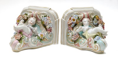 Lot 243 - A pair of Continental porcelain corbels / wall...