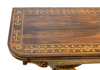 Lot 240 - A Regency Rosewood and Brass-Inlaid Foldover...