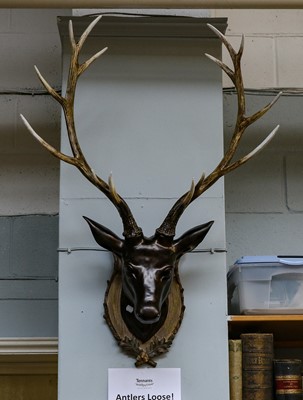 Lot 1197 - A Reproduction Red Deer head mount on shield