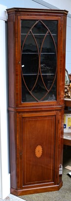 Lot 1185 - Narrow George III mahogany standing corner...