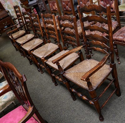 Lot 1150 - A set of six ladderback rush seated dining...