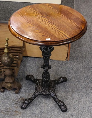 Lot 1214 - A pair of cast iron pedestal tables with...