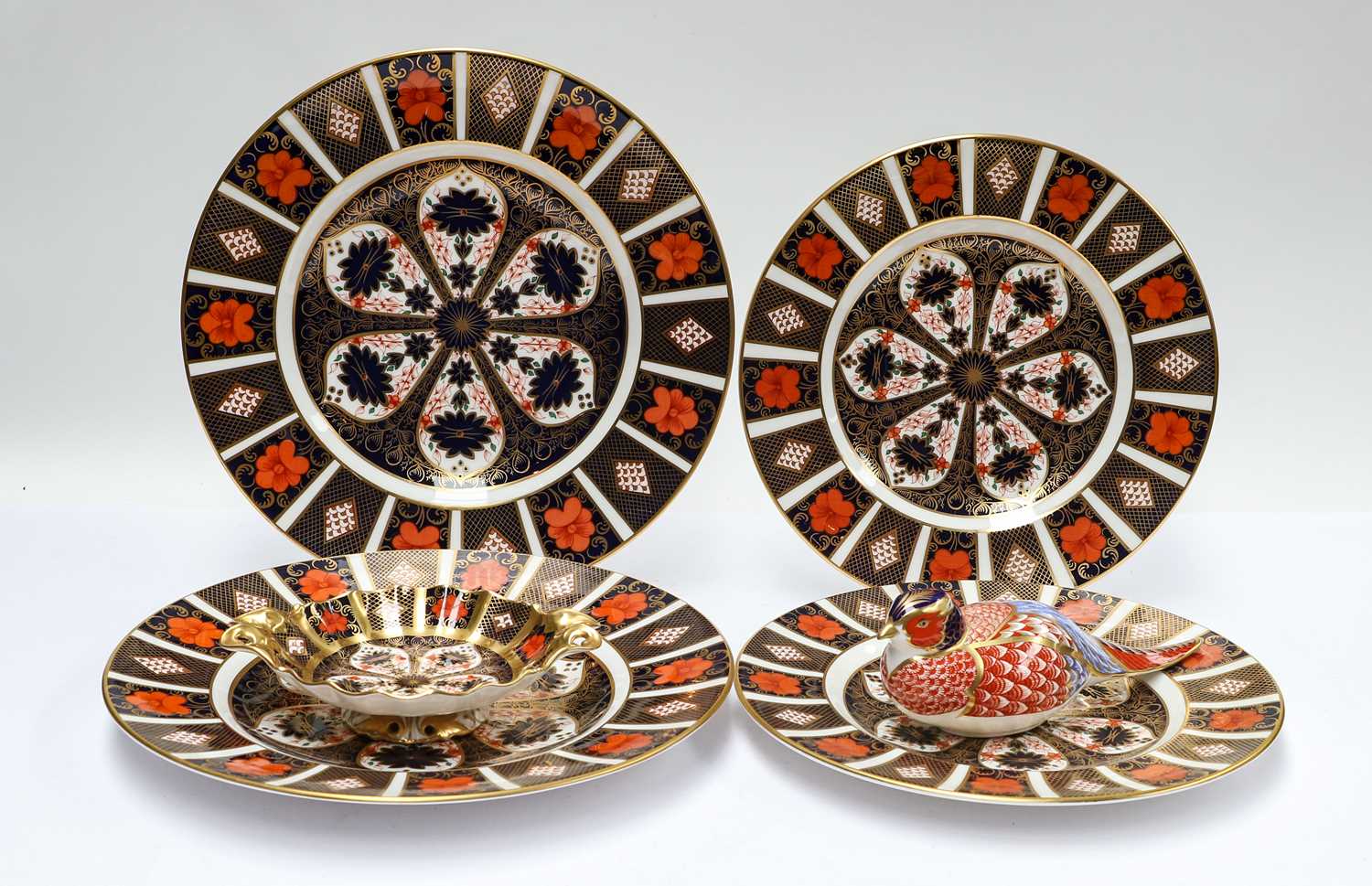 Lot 258 - Four Royal Crown Derby Imari plates pattern...