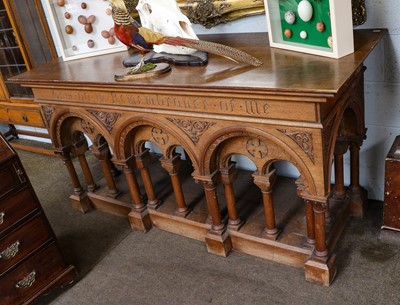 Lot 1098 - A gothic revival oak alter / sideboard...