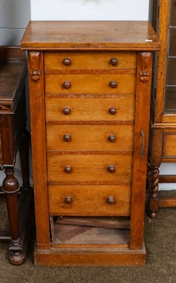 Lot 1105 - A Victorian oak Wellington chest with carved...