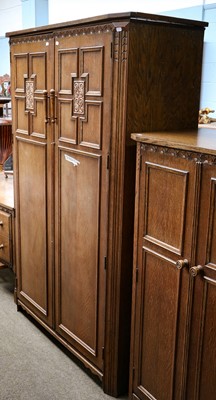 Lot 1220 - A 20th century carved oak three-part bedroom...