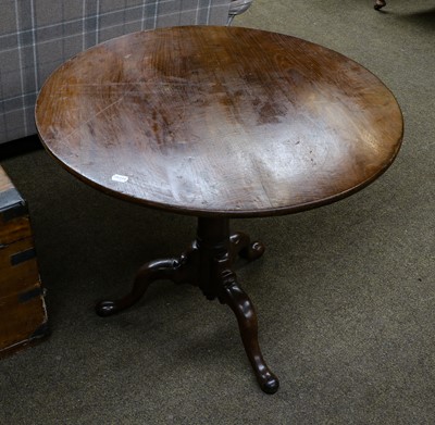 Lot 1272 - A George II mahogany tilt top tripod table,...