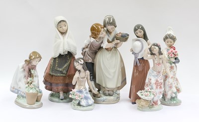 Lot 261 - A group of seven Lladro figures, including two...