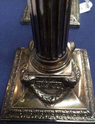 Lot 83 - A Pair of Victorian Silver Candlesticks by...
