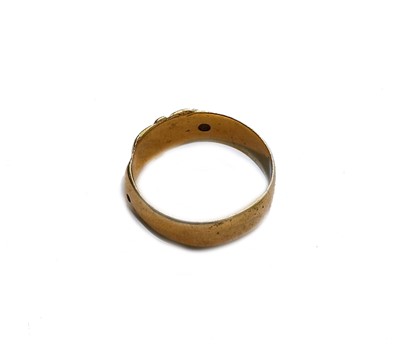 Lot 150 - An 18 carat gold buckle motif ring, finger...