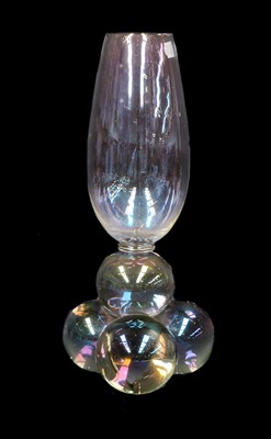 Lot 270 - An iridescent art glass vase, raised on a...