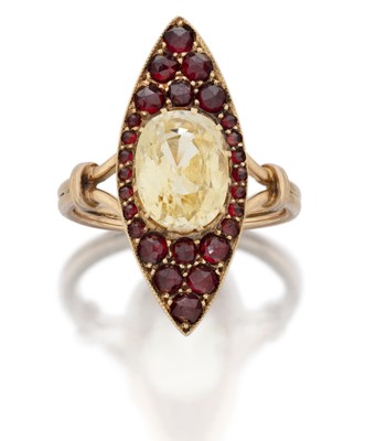 Lot 2019 - A Yellow Sapphire and Garnet Cluster Ring