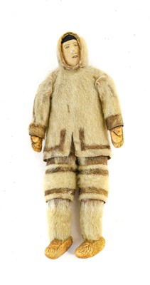 Lot 317 - An Inuit Doll, Arctic, with a woven head and...
