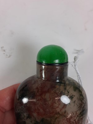 Lot 145 - A Chinese Moss Agate Snuff Bottle and Stopper,...