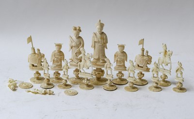 Lot 228 - A Cantonese stained and carved ivory chess set,...