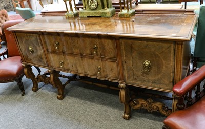 Lot 1234 - A large George V walnut sideboard crossbanded...