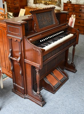 Lot 1241 - An Edwardian carved mahogany pedal organ 'Bell...