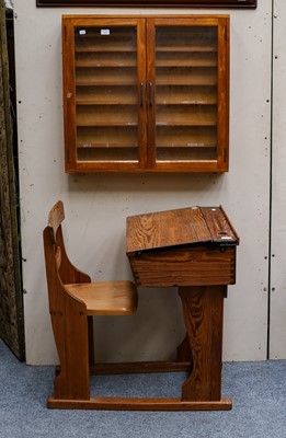 Lot 1247 - An early 20th century pitch pine school desk...