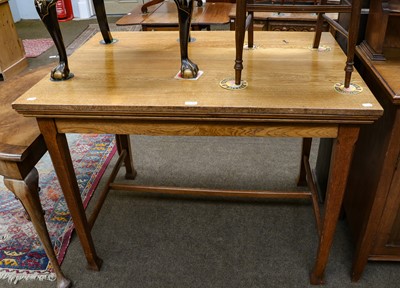 Lot 1118 - A George V light oak alter table, raised on...