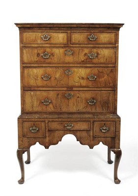 Lot 1148 - A George II Walnut Chest on Stand, 2nd quarter 18th century, the cavetto cornice above two...