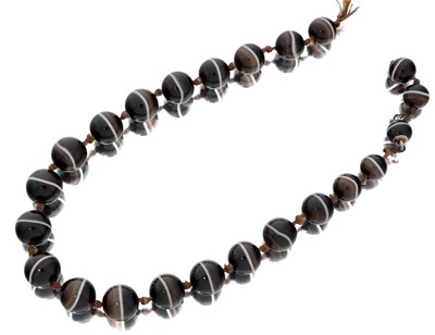 Lot 2012 - A Banded Agate Necklace Section