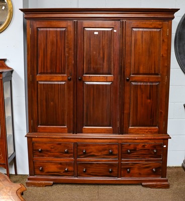 Lot 1186 - A reproduction mahogany triple wardrobe,...