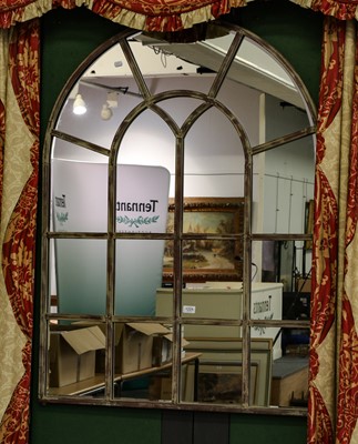 Lot 1224 - A modern arch top hanging mirror with overlaid...