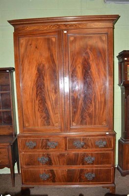 Lot 502 - A large mahogany inlaid linen press