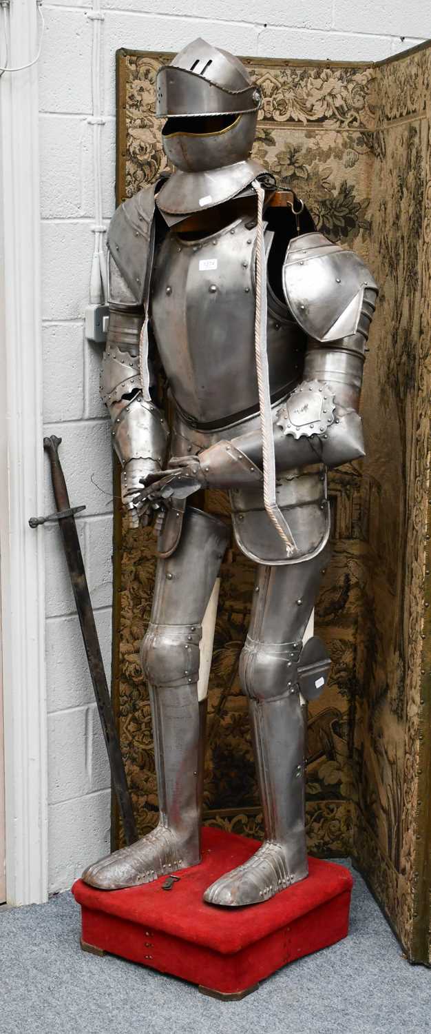 Lot 1274 - A reproduction suit of armour based on a 15th...