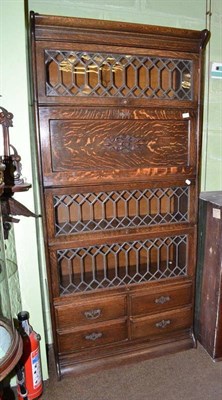 Lot 511 - Oak sectional bookcase with bureau