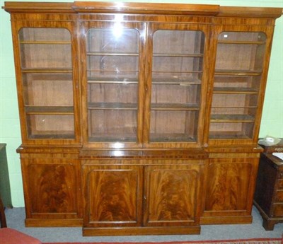 Lot 1150 - A Victorian Mahogany Four-Door Library Breakfront Bookcase, 3rd quarter 19th century, the upper...