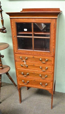 Lot 524 - An early 20th century crossbanded mahogany music cabinet, 51cm