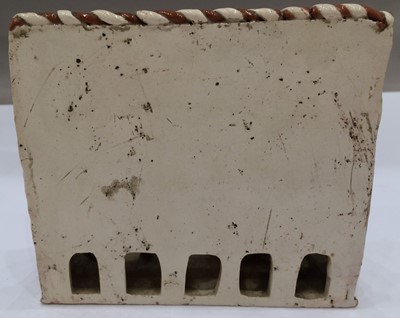 Lot 91 - A Cream Coloured Earthenware Pew Group, in mid...