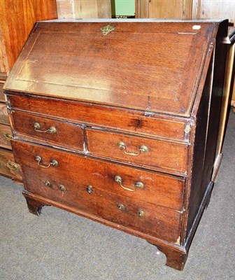 Lot 531 - A Georgian oak bureau