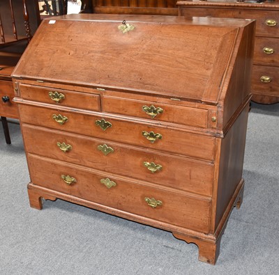 Lot 1129 - A George III mahogany bureau with fitted...