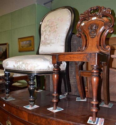 Lot 533 - Victorian ebonised nursing chair and a mahogany hall chair