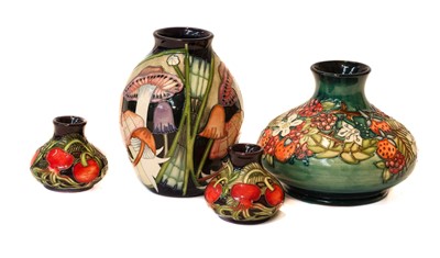 Lot 5 - A pair of miniature modern Moorcroft vases;...