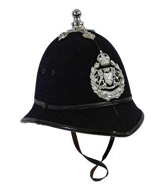 Lot 232 - A Plymouth Ball Top Police Helmet, in black...