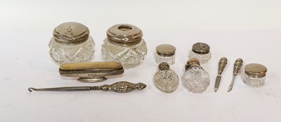Lot 314 - Two cut glass scent bottles with hinged white...