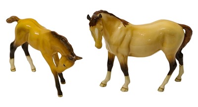 Lot 1145 - Beswick Mare (facing left) and Foal (large, head down)