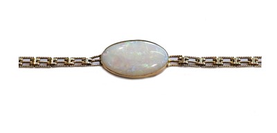 Lot 169 - A 9 carat gold opal bracelet, length 19.5cm