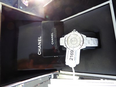 Lot 2169 - Chanel: A Lady's White Ceramic Centre Seconds Wristwatch