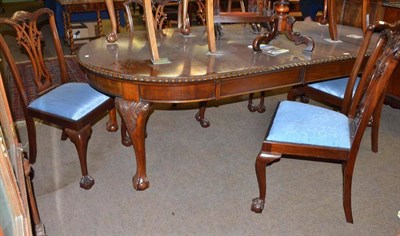 Lot 547 - Chippendale style mahogany dining table with two extra leaves and eight chairs (including two...