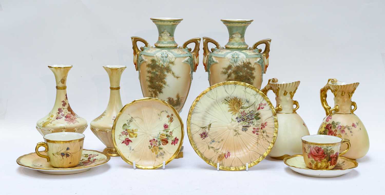 Lot 35 - A pair of Royal Worcester twin handled...