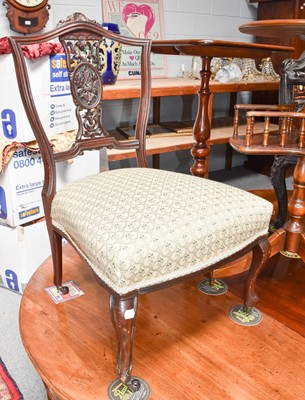 Lot 1117 - A small Edwardian mahogany nursing chair with...