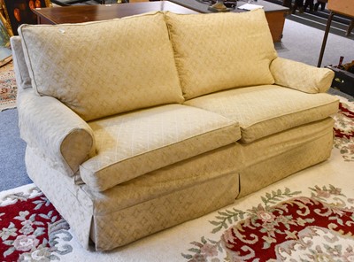 Lot 1249 - A cream two-seater sofa, 192cm wide