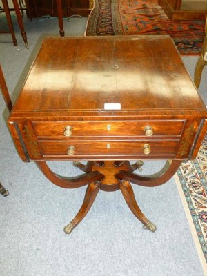 Lot 1156 - A Regency Rosewood and Brass Inlaid Work Table, early 19th century, the rounded drop leaves...