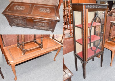 Lot 1122 - An Edwardian mahogany slender glazed fronted...