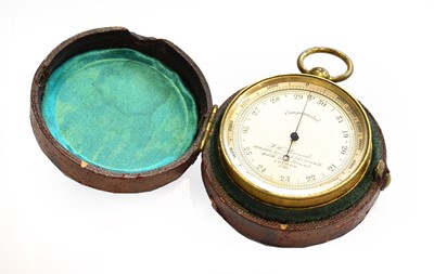 Lot 248 - A brass pocket aneroid barometer, signed J H...