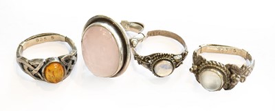 Lot 270 - Four gem-set rings, including moonstone, rose...